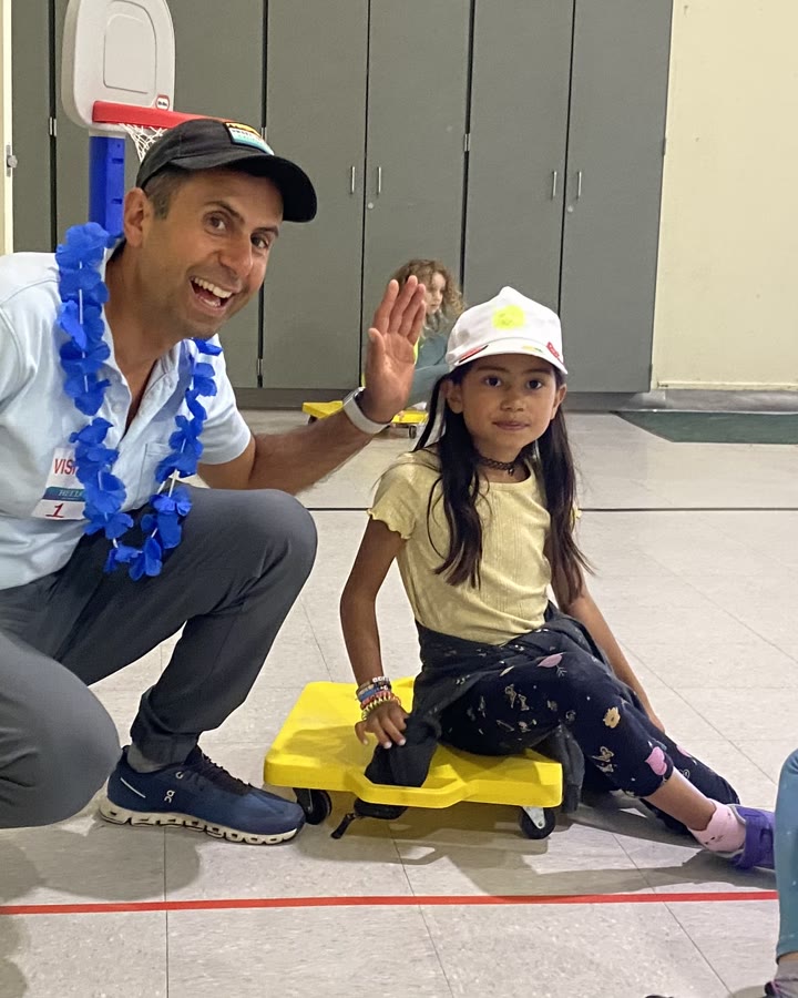 With his daughter at Reed School